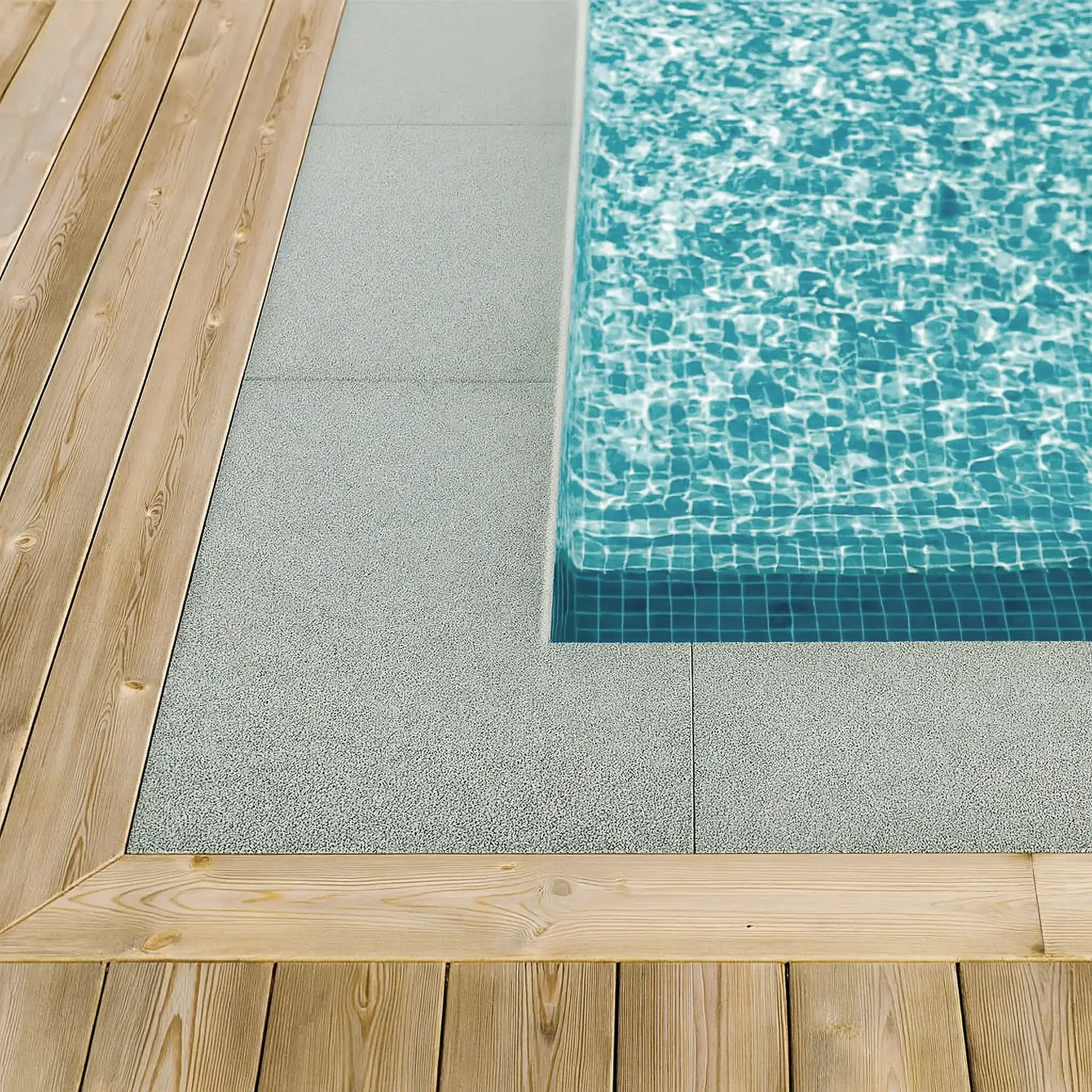 En bild på kantsten tillsammans med trä vilket är halksäkert och vackert runt Poolen